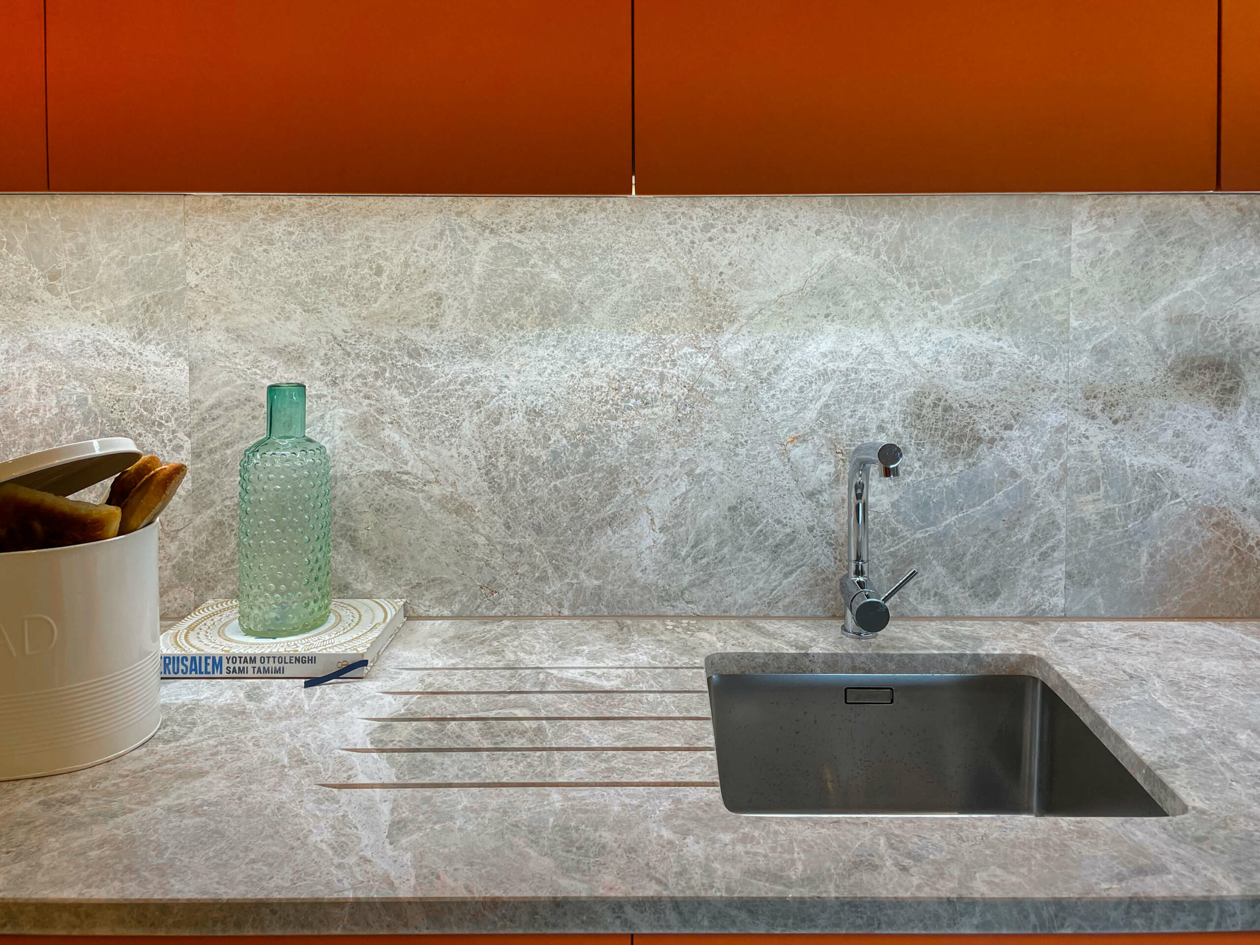 AUTHOS architecture renovation apartment kitchen marble beige orange scaled